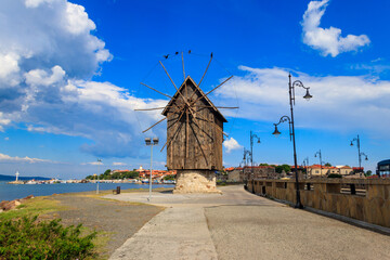 Fototapeta na wymiar Old wooden windmill in the old town of Nessebar, Bulgaria