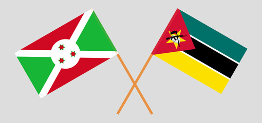 Crossed flags of Burundi and Mozambique. Official colors. Correct proportion