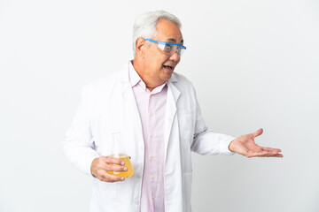 Middle age Brazilian scientific man scientific isolated on white background with surprise expression while looking side