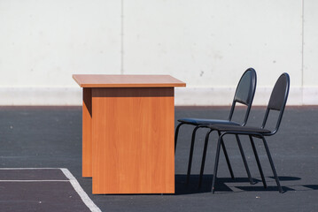 Table and chairs for a sports judge.