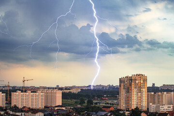 Thunderstorm and lightning over city