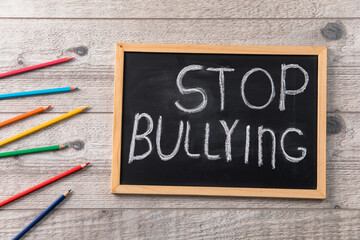 text STOP BULLYING and pencils