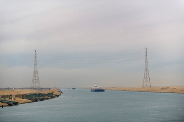 Suez canal transit. View from cargo vessel. Work at sea. Commercial shipping.