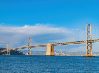 Fototapeta na wymiar Sunny view of The San Francisco Oakland Bay Bridge