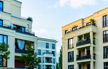modern white apartment building in townhouse style