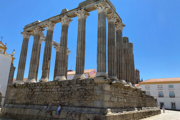 Fototapeta premium Evora, Portugal: 09/06/2021: Ancient roman temple of Diana in the old city of Evora, Portugal. Historical ruins part of the UNESCO World Heritage Site