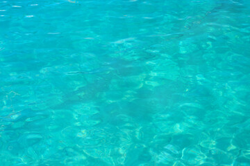 Background with light blue water with turquoise hues