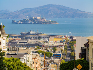 Sunny view of the Alcatraz Island and San Francisco Bay with some residence building