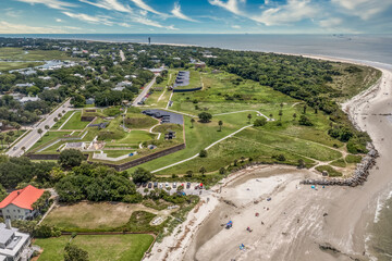 Obraz premium Aerial view of Fort Moultrie on Sullivan's island Charleston, South Carolina from the American Revolutionary war protecting the harbor with gun battery blue cloudy sky