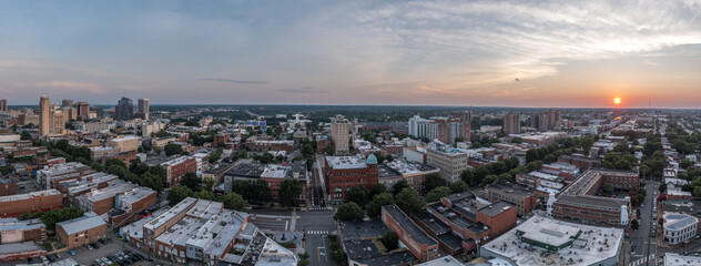 Aerial sunset view of Richmond capital city of Virginia with dramatic sky overlooking the fan...