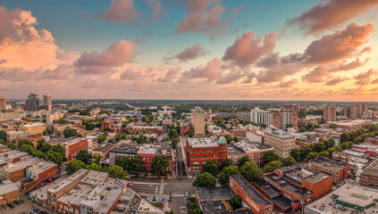 Aerial sunset view of Richmond capital city of Virginia with dramatic sky overlooking the fan district and monroe ward, main street 
