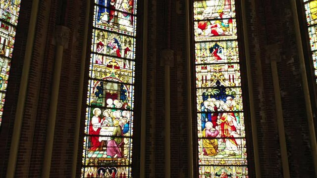 Intricate And Colorful Stained Glass Windows At Gouwekerk (Sint-Jozefkerk) In Gouda, Netherlands. - panning