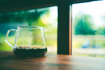 barista brewing a coffee filter drip in the morning, beverage drink with fresh black espresso...