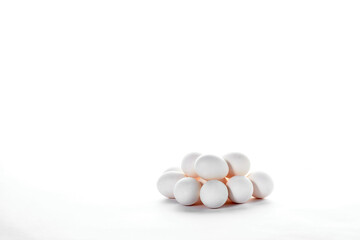 Group of white eggs in white background.