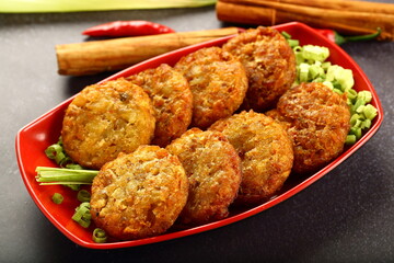 Homemade vegetable cutlets  served in a ceramic plate.