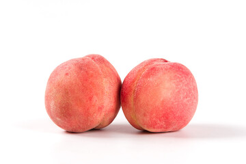 Ripe peach fruit close-up isolated on white background