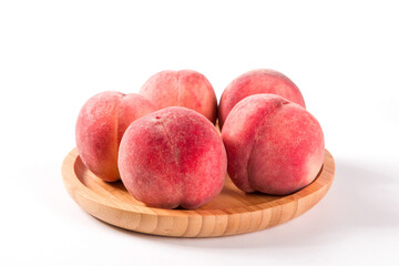 Ripe peach fruit close-up isolated on white background