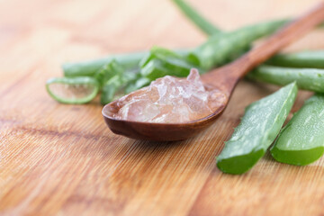 Aloe vera meat collected from aloe vera is in a spoon - obrazy, fototapety, plakaty