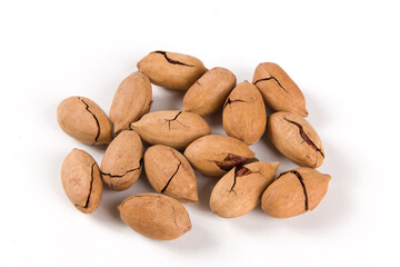 Heap or stack of pecan on white background.