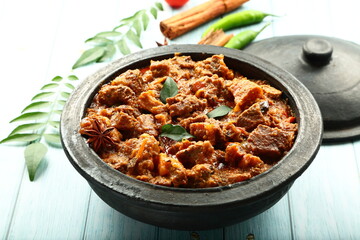 Homemade delicious Indian beef curry roast- Kerala foods background.