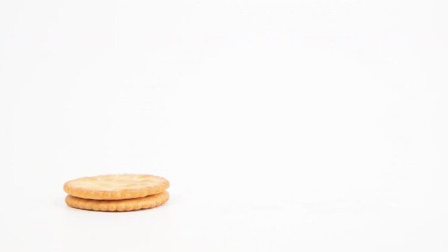 Stop motion animation Biscuits Cookies stacks on White background.