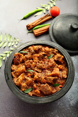 Homemade delicious Indian beef curry roast- Kerala foods background.