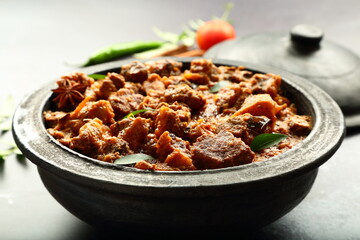 Delicious Indian mutton curry roast, traditional recipes background.