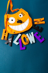 Happy Halloween wooden letters with pumpkins, spiders and other decorations