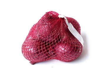 red onion in red packaging bag on white background