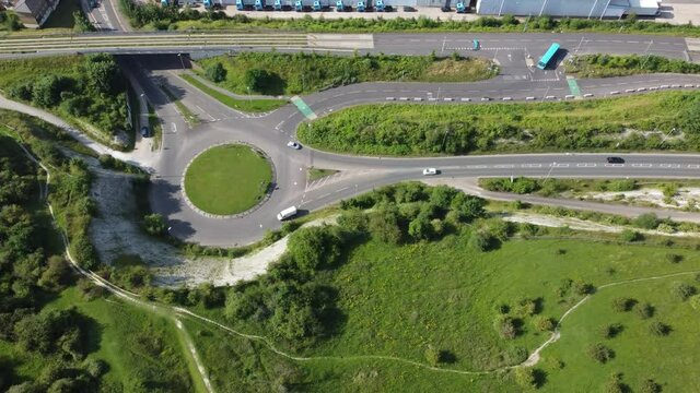 Great aerial drone footage over city and roads