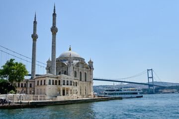 Fototapeta na wymiar Ortakoy Mosque near the Bosphorus Bridge on the Bosphorus pier