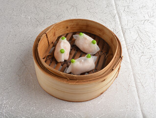 steamed pork meat prawn seafood vegetable crystal skin dumpling jiaozi in bamboo basket Hong Kong dim sum menu
