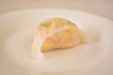 steamed pork meat prawn seafood vegetable crystal skin dumpling jiaozi in bamboo basket Hong Kong dim sum menu