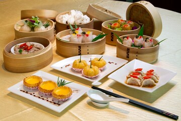 group Hong Kong dim sum menu dining table banquet Chinese restaurant with deep fried dessert and...