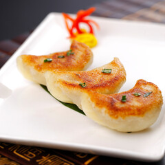 steamed pork meat prawn seafood vegetable crystal skin dumpling jiaozi in bamboo basket Hong Kong dim sum menu