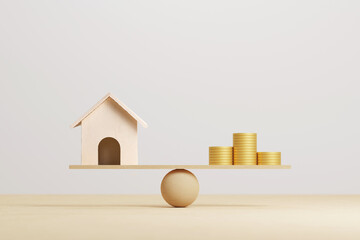 Wooden home and money coins stack on wood scale. Property investment and house mortgage financial...