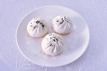 steam pan fried baozi bun bread with pork meat char siew inside Hong Kong dim sum menu