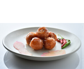 Northeastern Sausage in a white plate on a white background.