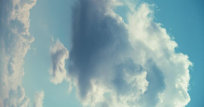 Vertical blue sky with clouds time lapse slow motion 4K DCI 60 fps
