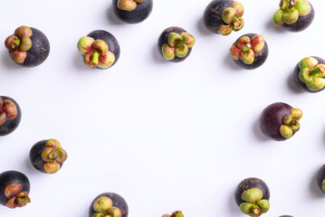 Mangosteen fruit on white background with copy space, Flat lay, Tropical fruit