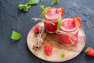 Healthy smoothie of fresh summer berries. Creative atmospheric decoration