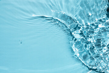 Summer banner background. Blue liquid colored clear water surface texture with splashes bubbles....