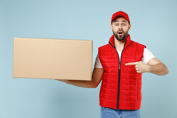 Professional delivery guy employee man in red cap white T-shirt vest uniform workwear work as...