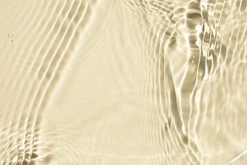 Summer banner background. Yellow liquid colored clear water surface texture with splashes bubbles. Trendy nature background. Transparent clear water.
