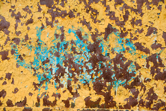 Broken shabby paint on rusty iron sheet, grunge surface