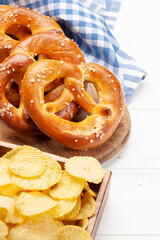 Fresh baked homemade pretzel and potato chips