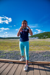 Young girl visiting Yellowstone National Park.