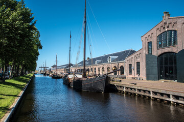 Fototapeta premium Old sailing boats in the harbor of Den Helder, the Netherlands.