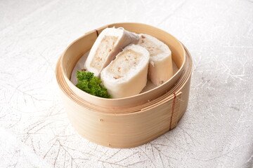 steamed teo chew white bun bao mantou wrapped with sticky glutinous rice inside in bamboo basket Hong Kong dim sum menu