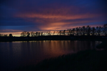 Fototapeta premium sunset over the river